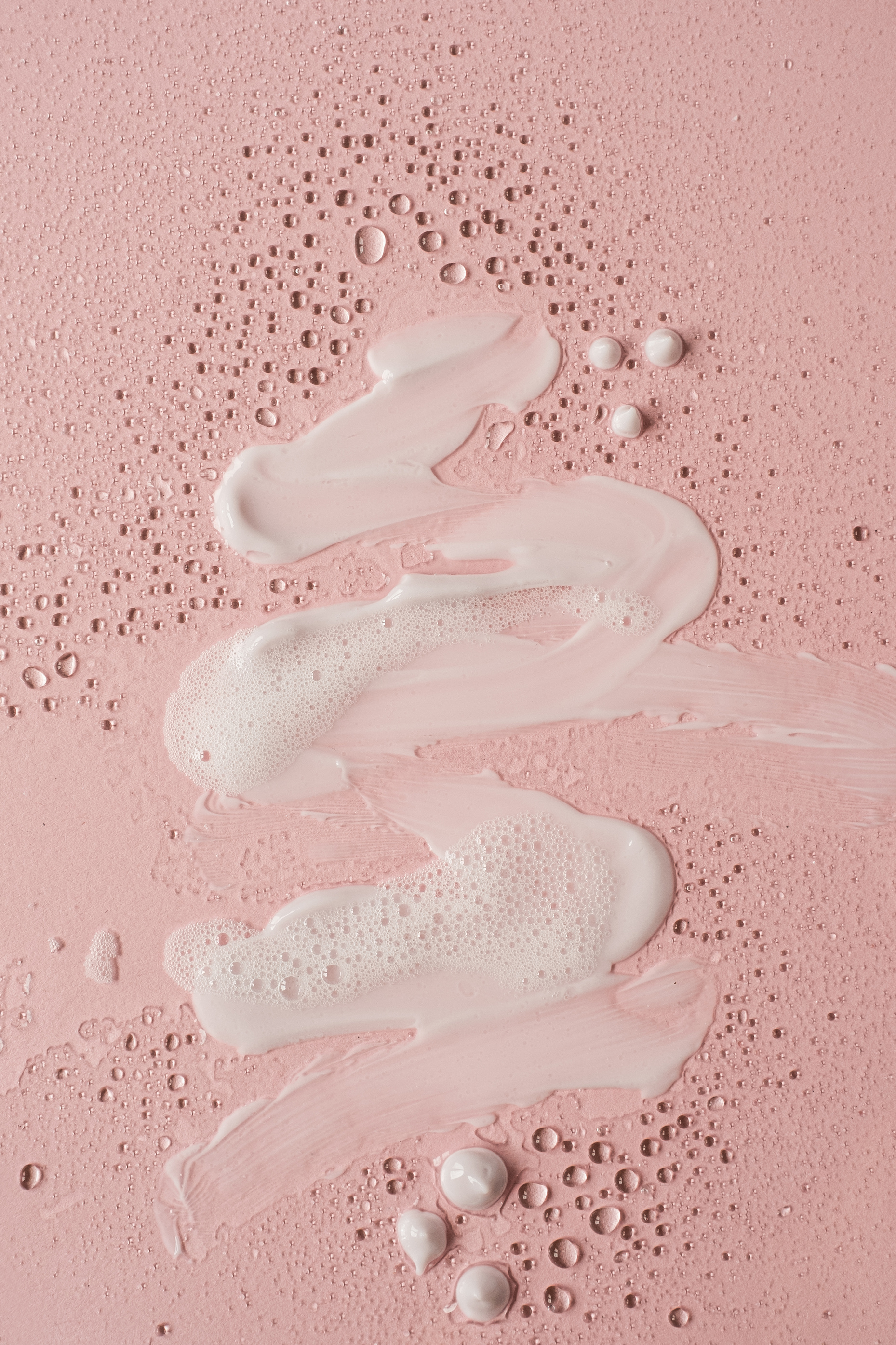 Skincare Cream Swatches on Pink Background 